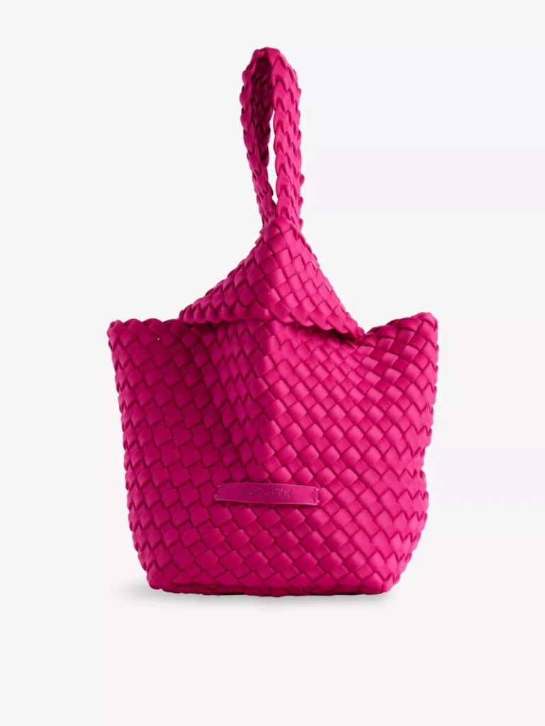 Fuchsia pink Naghedi Kyoto small woven clutch with looped handle and basketweave design