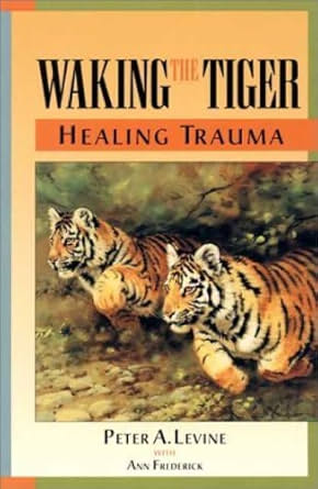 Cover of Waking the Tiger: Healing Trauma by Peter A. Levine — featuring two tigers in nature, symbolising somatic healing.