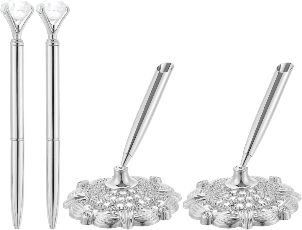 Silver pen set with crystal tops and decorative flower-shaped bases — elegant writing tools for journaling or ceremony use.