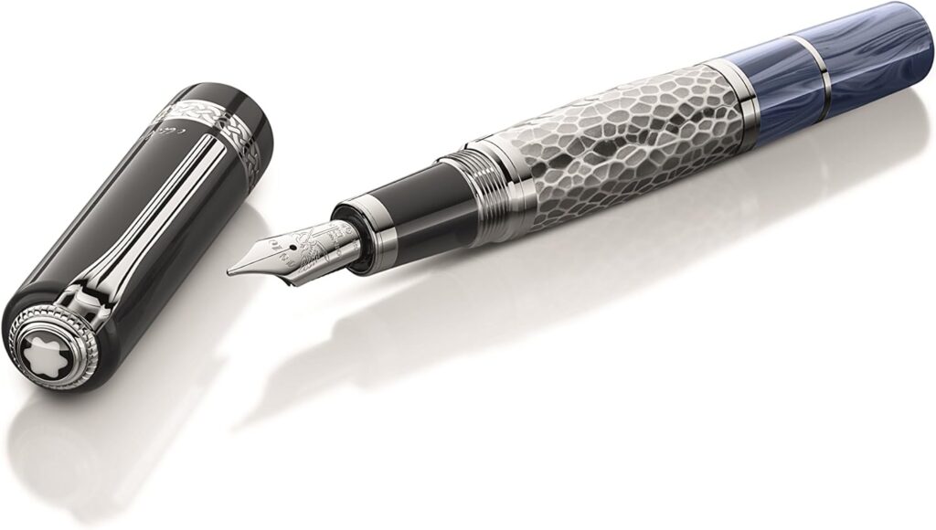 Luxury fountain pen with engraved silver grip and deep blue barrel, shown with cap removed — premium writing instrument for elegant expression.