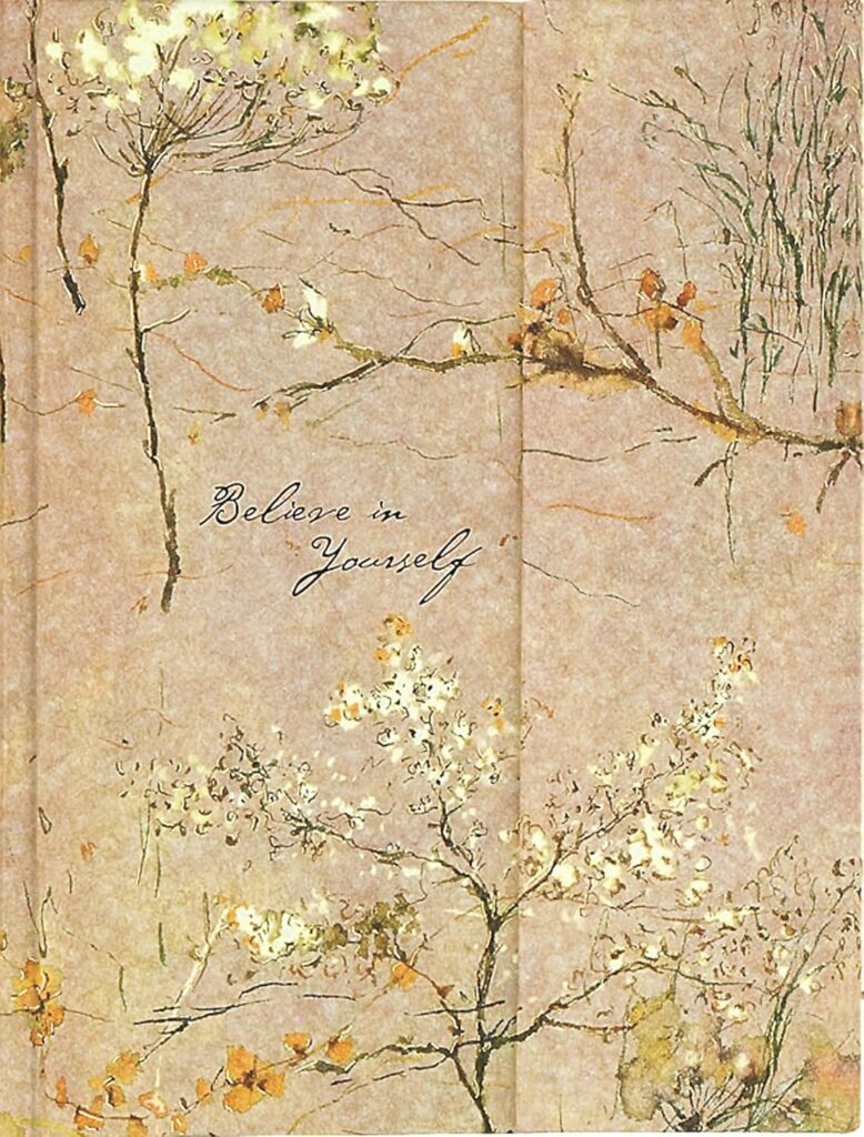 Floral hardcover journal with soft vintage design and the phrase “Believe in Yourself” on the cover — ideal for self-reflection and inspiration.