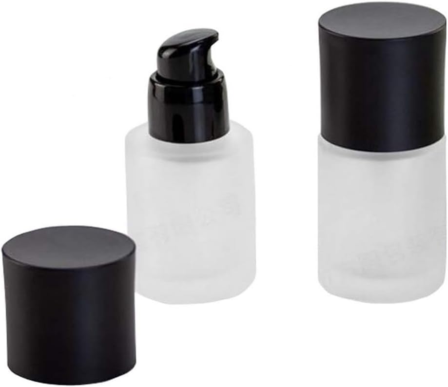Minimalist frosted glass eye cream bottles with black caps and dispenser pump.