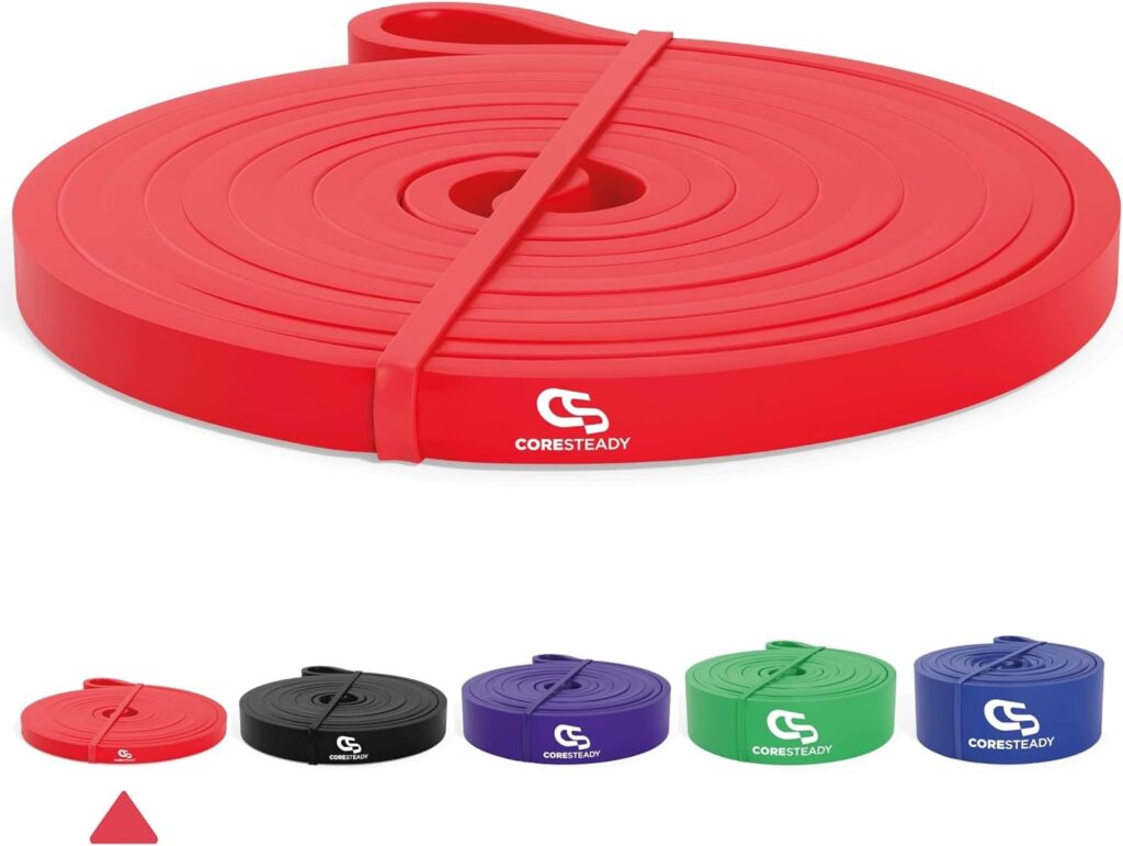 Coresteady heavy duty red pull up band coiled with visible logo, shown alongside other colour strength options