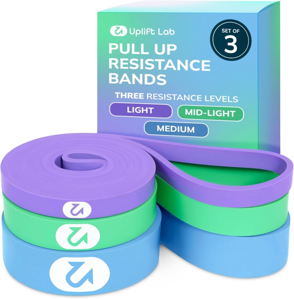 Uplift Lab pull up resistance bands in blue, green, and purple with boxed packaging showing three resistance levels