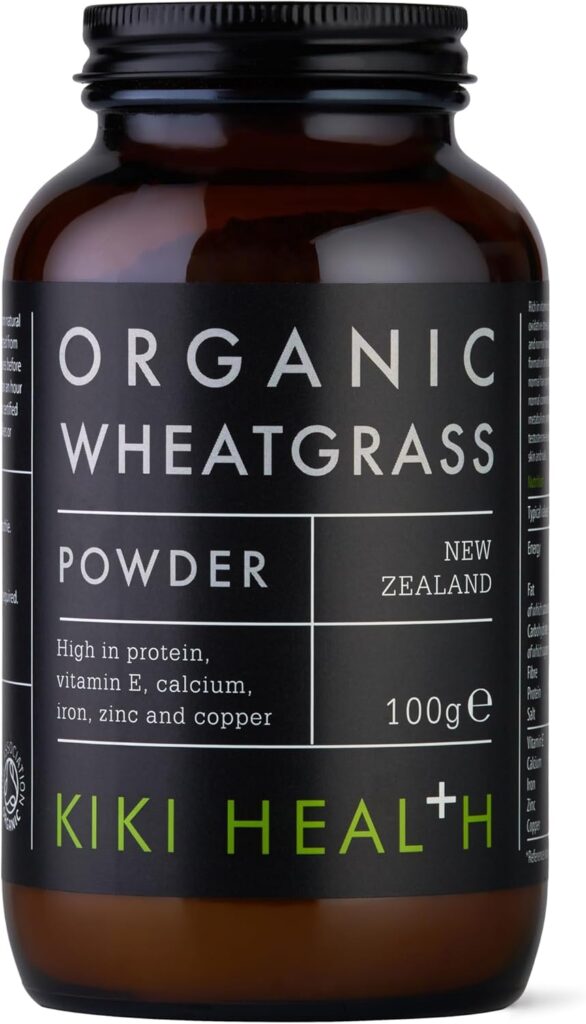 Kiki Health Organic Wheatgrass Powder in dark amber glass jar with black label