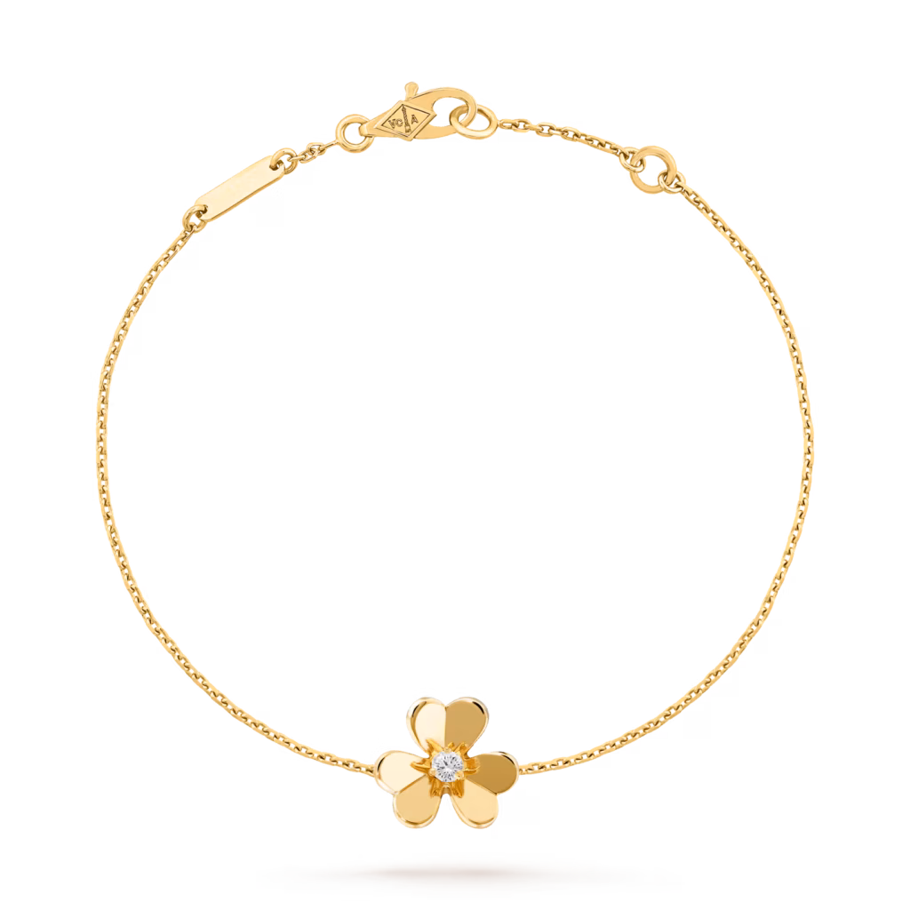 Van Cleef & Arpels Frivole mini bracelet in 18k yellow gold with a diamond-set flower.