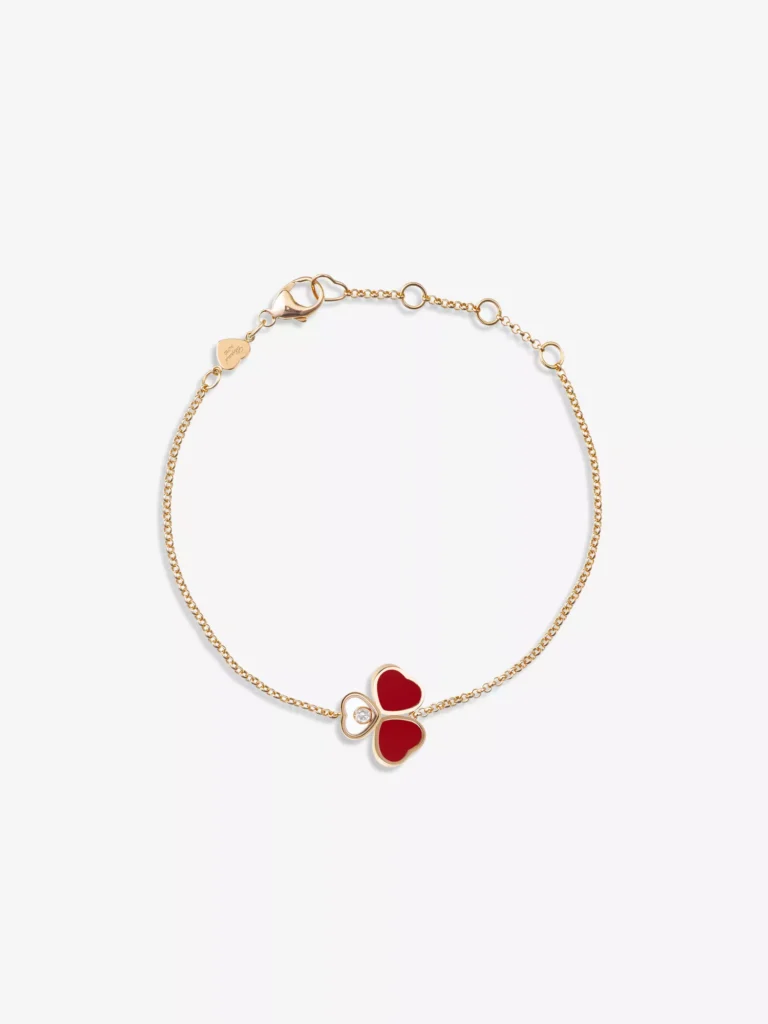 Chopard Happy Hearts Wings bracelet in 18ct rose gold with red heart motifs and 0.05ct diamond — luxury feminine jewellery piece.