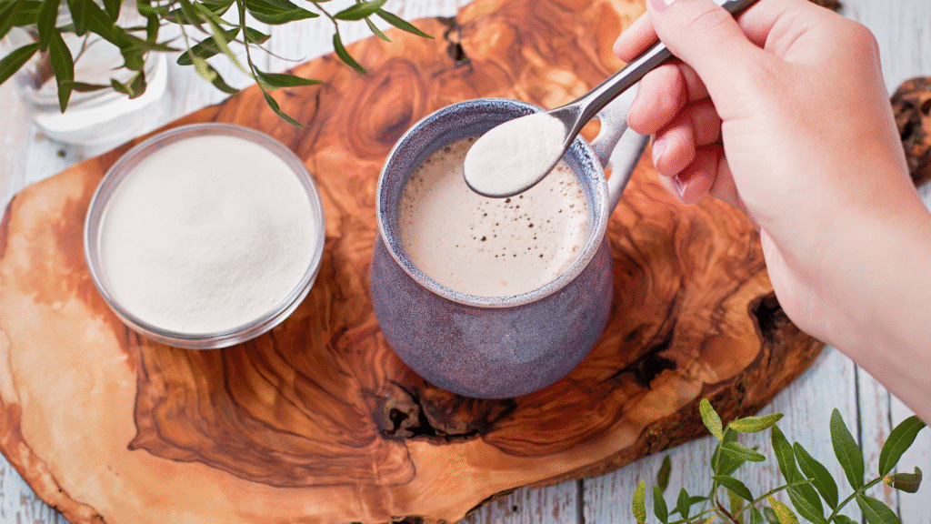 Collagen being stirred into chicory latte in natural light